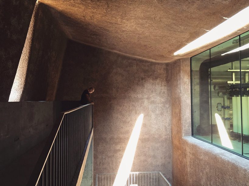 oppenheim architecture wraps muttenz's water treatment plant in an ever-changing facade