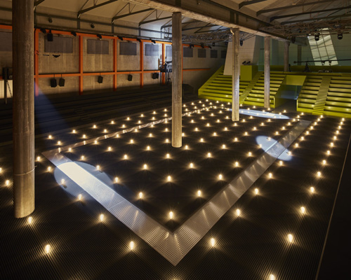 AMO fills prada's deposito with terrain of theatrical lights for the autumn/winter 2019 show