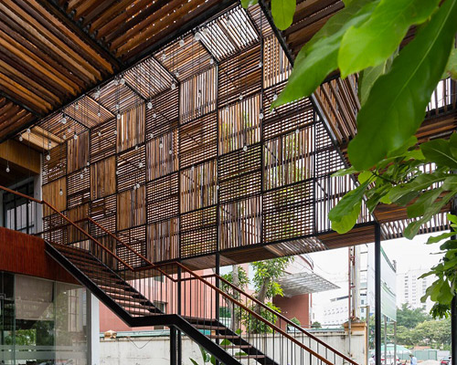 H2 uses reclaimed wood to design the saigon thuong mai hotel in vietnam