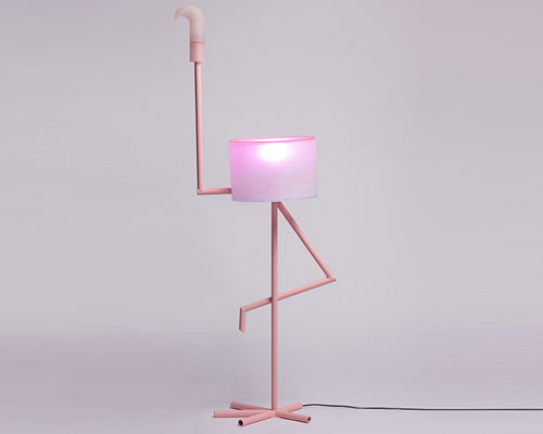I am cutie is a flamingo-shaped lamp that turns into a table