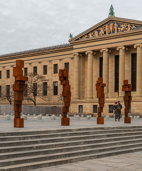 antony gormley arrays abstracted, cast-iron figures along philadelphia museum's iconic steps