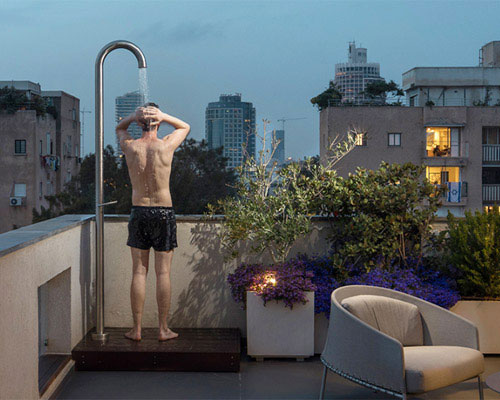 this holiday apartment in tel aviv features open rooftop terrace with shower on it