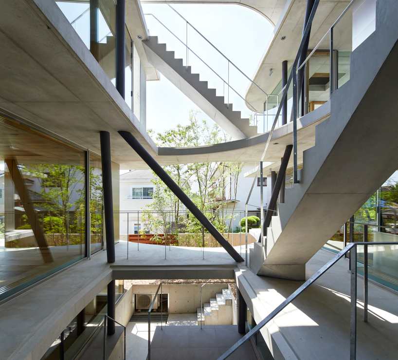 tomohiro hata constructs the 'ground house' in response to the density of osaka