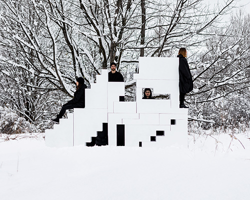 students reconfigure snowy architectural components in an experimental workshop