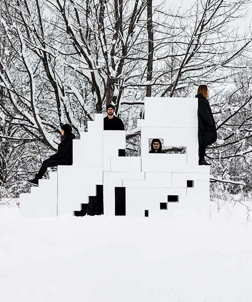 students reconfigure snowy architectural components in an experimental workshop