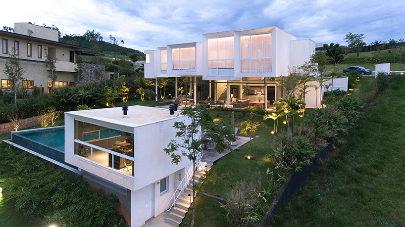 FGMF arquitetos cantilevers white volumes in sao paulo's neblina house designboom