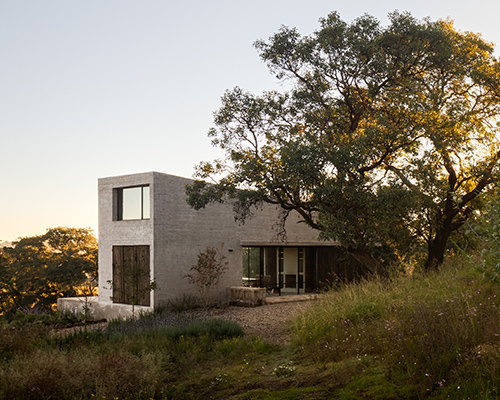 this isolated house expresses raw materiality among the landscape of aculco, mexico