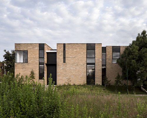 andres burguete creates 'house el cielo' from three brick volumes in mexico