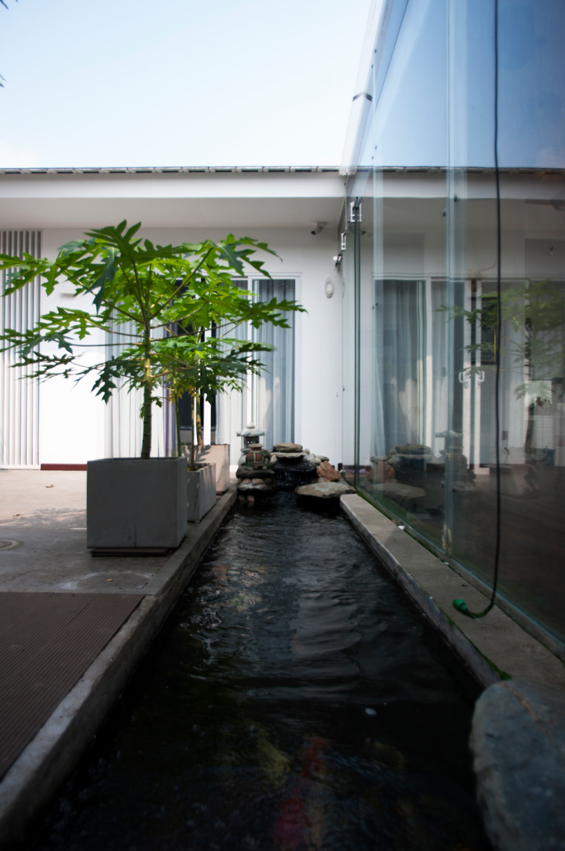 U-shaped residence by atelier NgNg references traditional vietnamese garden houses