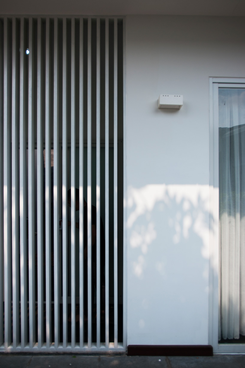 U-shaped residence by atelier NgNg references traditional vietnamese garden houses