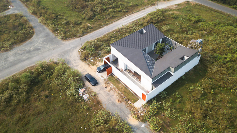 U-shaped residence by atelier NgNg references traditional vietnamese garden houses