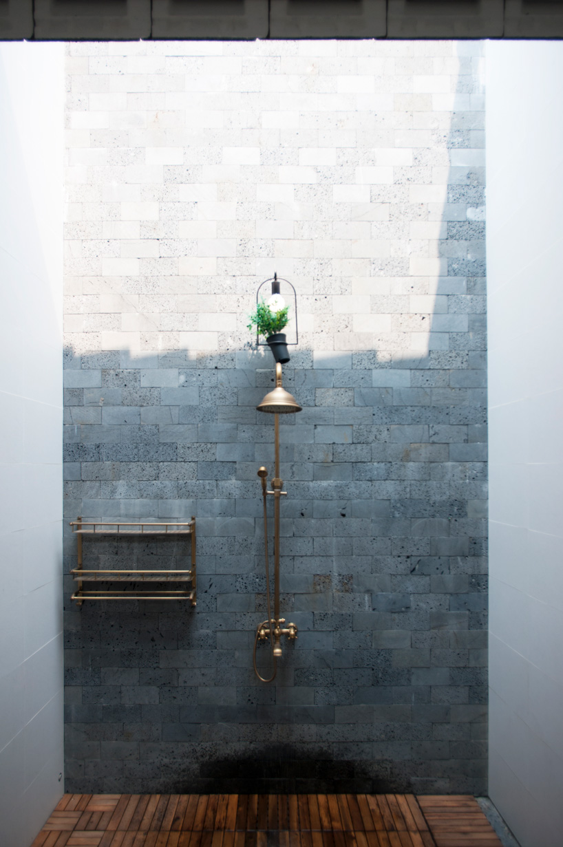 U-shaped residence by atelier NgNg references traditional vietnamese garden houses