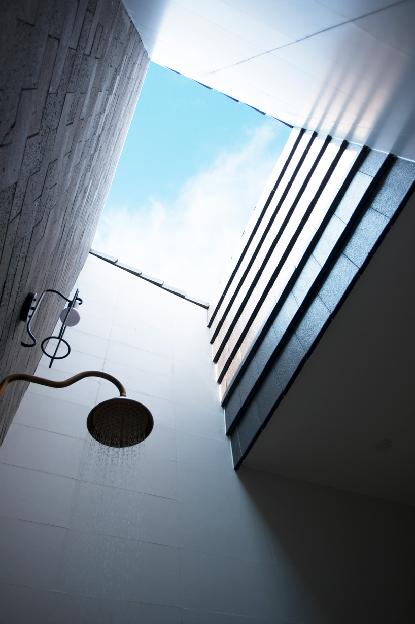 U-shaped residence by atelier NgNg references traditional vietnamese garden houses