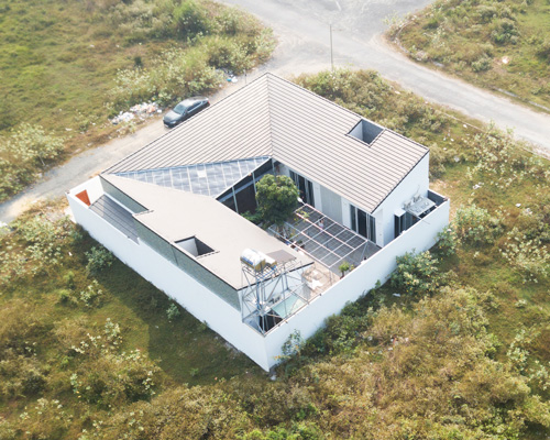 U-shaped residence by atelier NgNg references traditional vietnamese garden houses