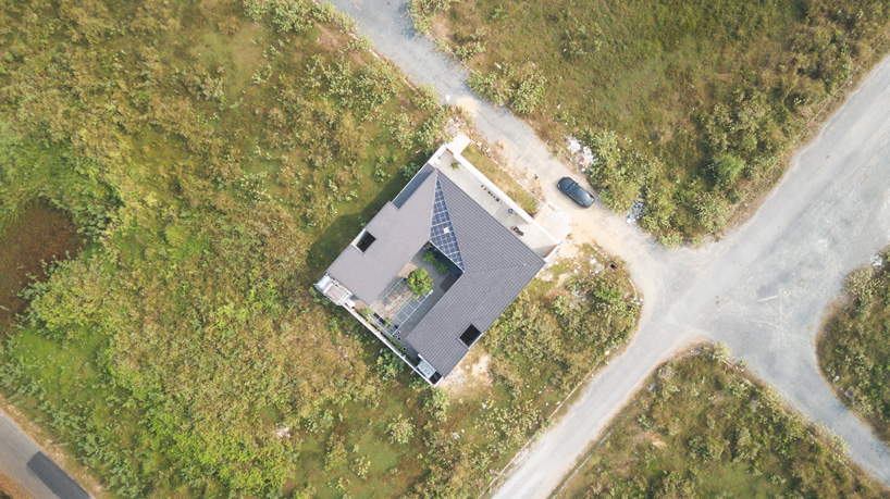 U-shaped residence by atelier NgNg references traditional vietnamese garden houses