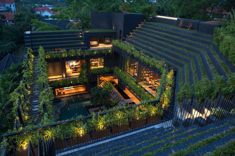 CHANG architects creates stepped garden on the roof of a house in singapore