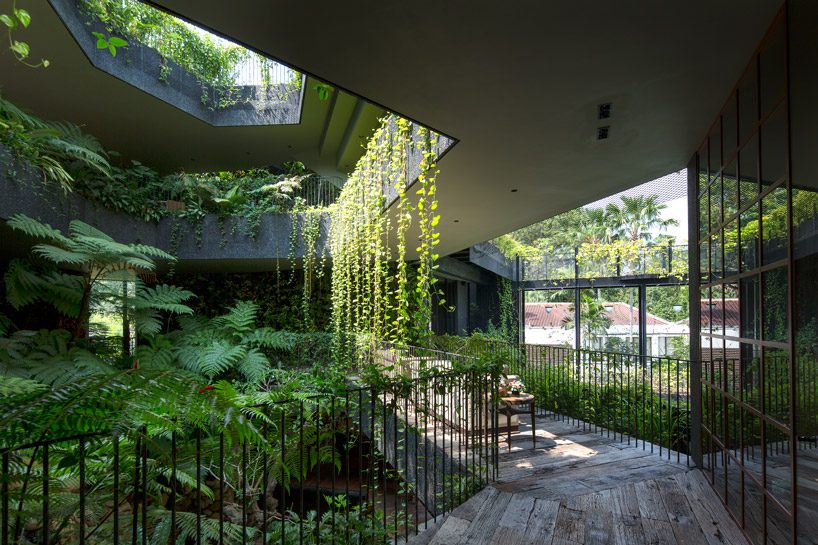 CHANG architects creates stepped garden on the roof of a house in singapore