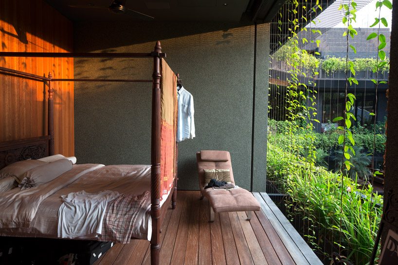 CHANG architects creates stepped garden on the roof of a house in singapore
