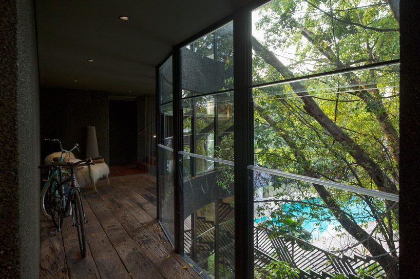 CHANG architects creates stepped garden on the roof of a house in singapore