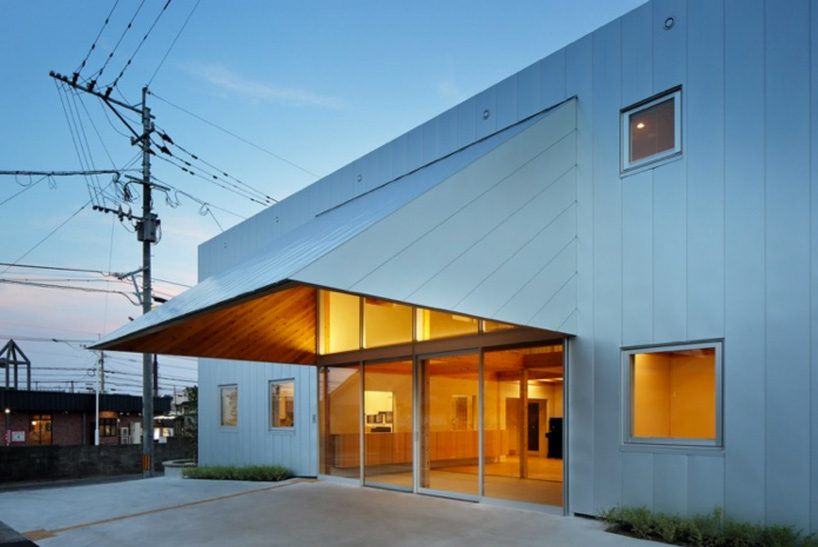 intermedia completes japanese nursing home with triangular wooden canopy