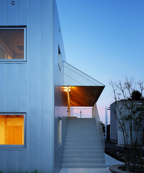 sho sasaki/INTERMEDIA completes japanese nursing home with triangular wooden canopy