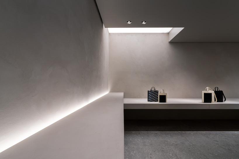 john pawson transforms valextra's milan store with monochromatic ...