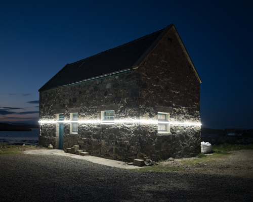 lines of light mark inevitable sea level rise from climate change