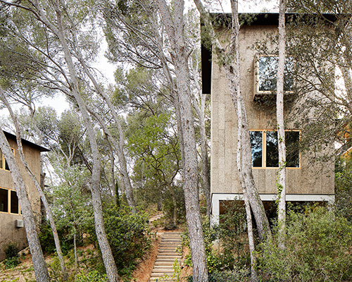 in catalonia, lópez rivera arquitectos presents two houses clad in cork