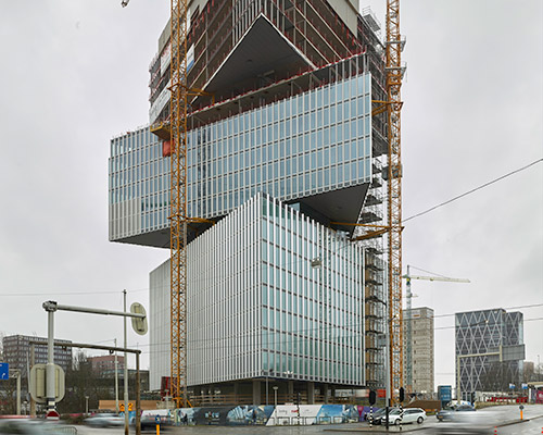 OMA / reinier de graaf's Nhow amsterdam RAI hotel tops out