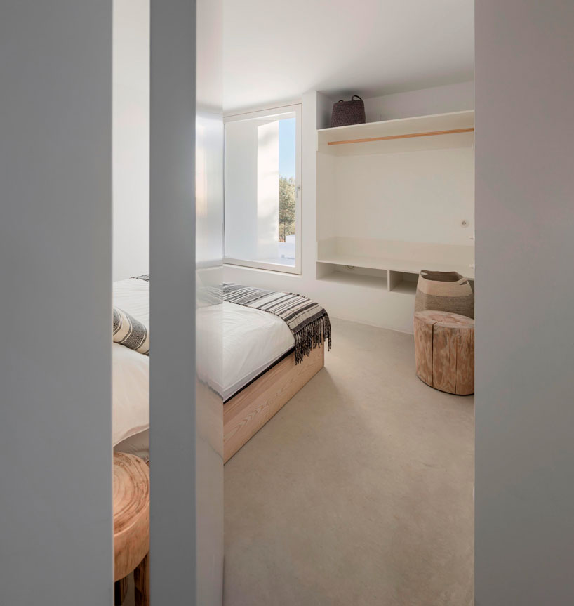 the minimalist casa luum villa by pedro domingos embraces local topography