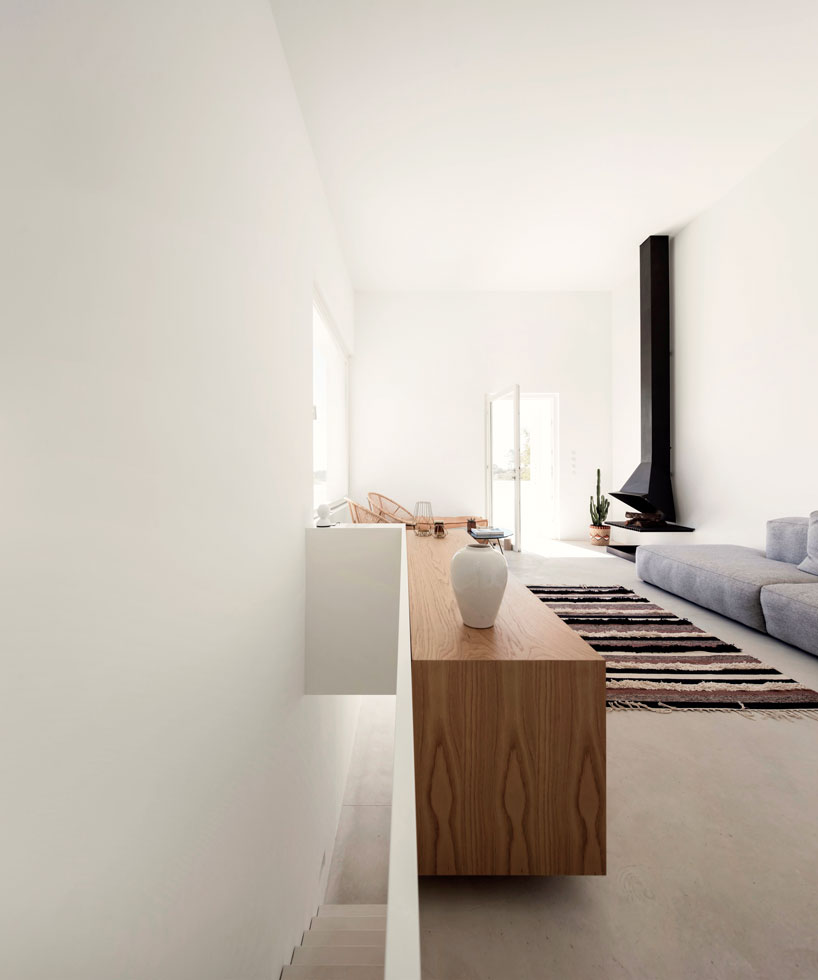 the minimalist casa luum villa by pedro domingos embraces local topography