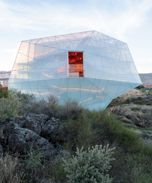 translucent conference center by selgascano appears as a luminous form