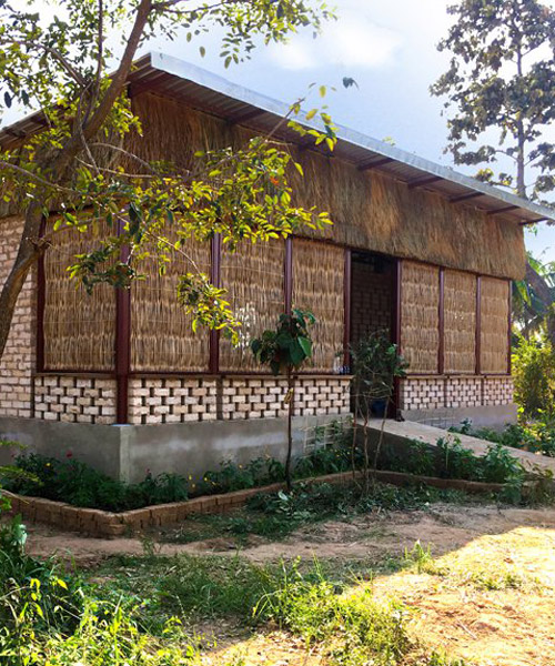 agriculture center in cambodia uses earth bricks, clay and bamboo for natural ventilation
