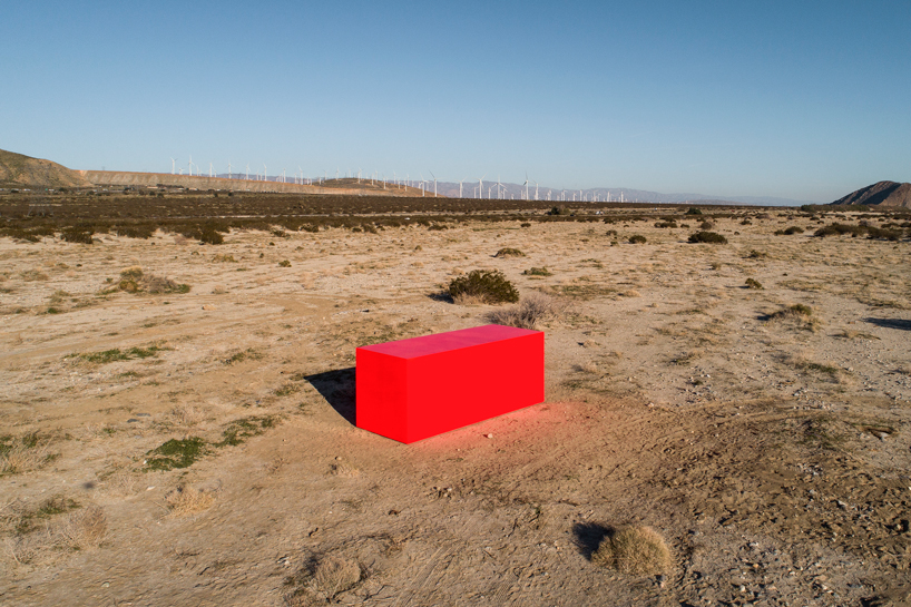 sterling ruby embeds neon orange monolith into coachella valley's desert landscape
