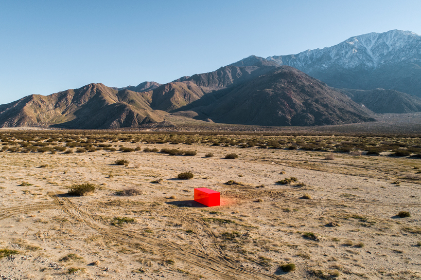 sterling ruby embeds neon orange monolith into coachella valley's desert landscape