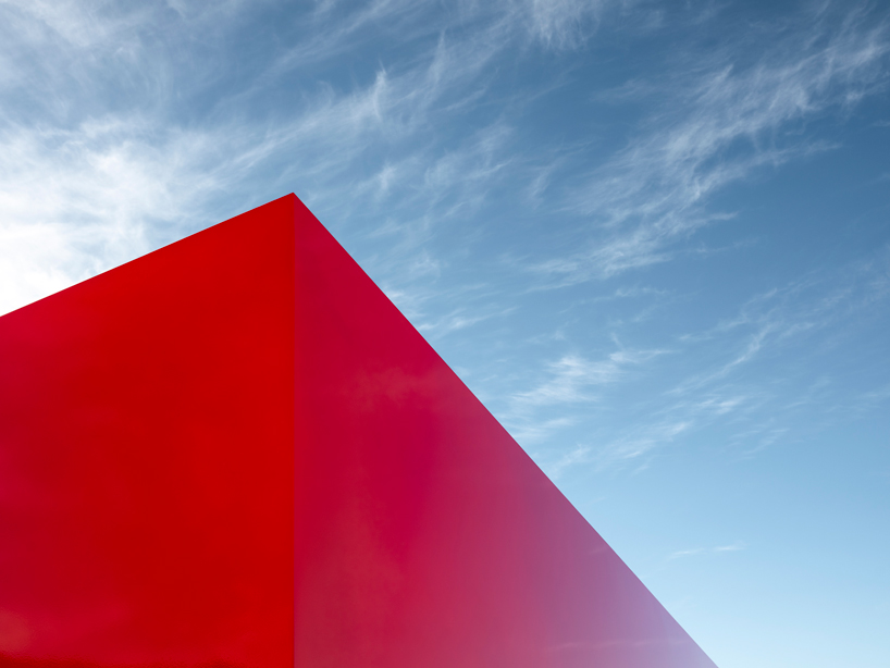 sterling ruby embeds neon orange monolith into coachella valley's desert landscape