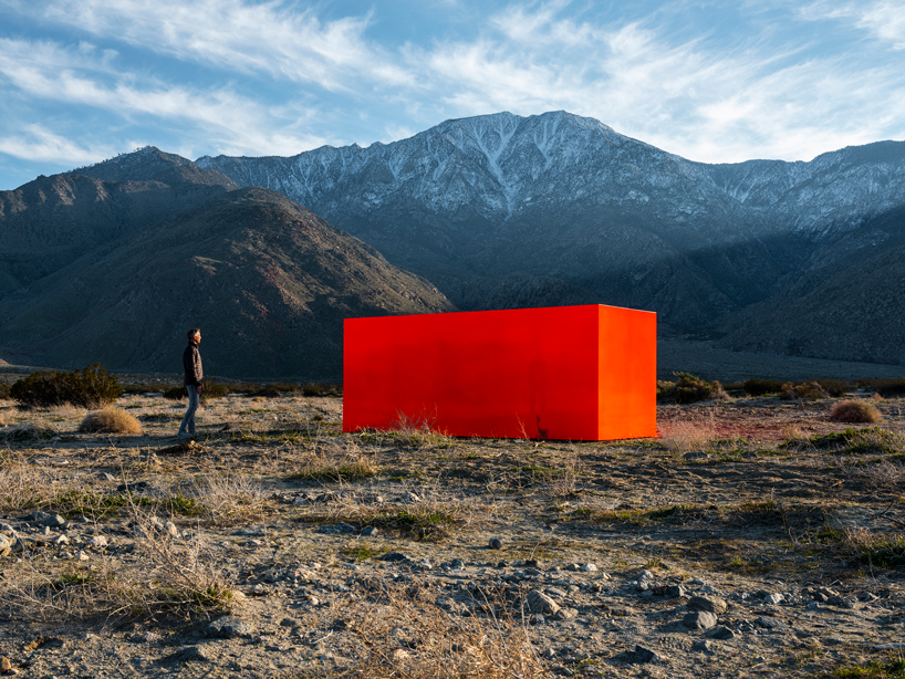 sterling ruby embeds neon orange monolith into coachella valley's desert landscape