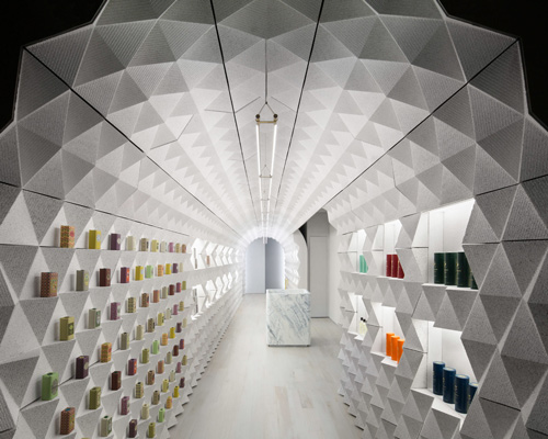 tacklebox contains claus porto's new york store within a freestanding archway