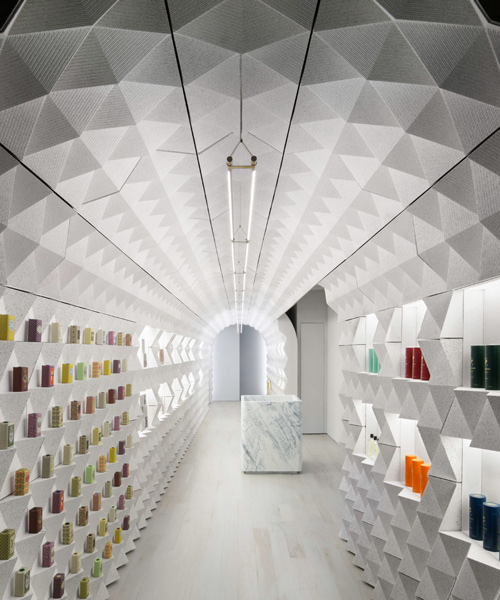 tacklebox contains claus porto's new york store within a freestanding archway