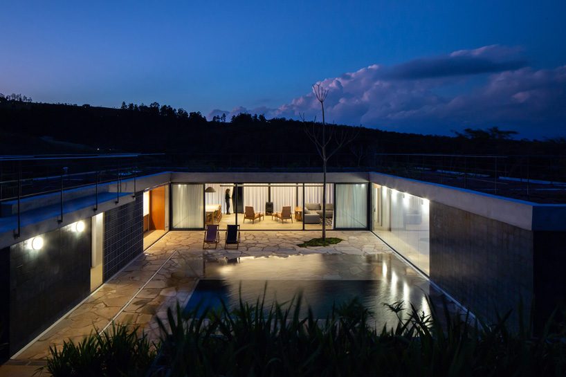 casa joão de barro by terra e tuma emerges from a sloping site in itatiba, brazil