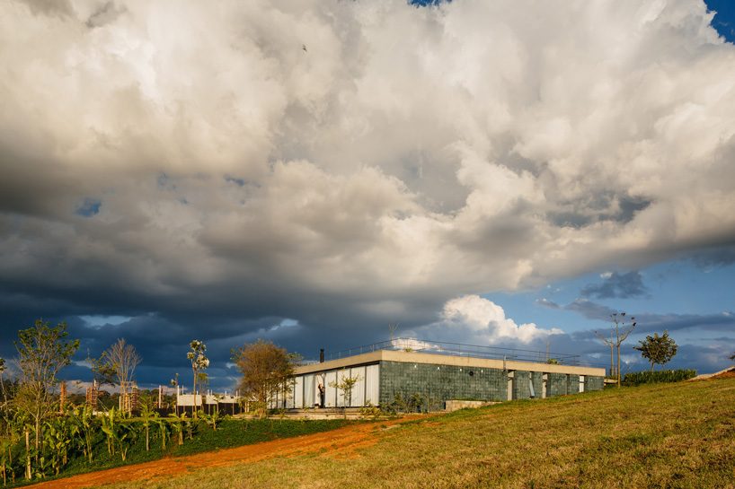 casa joão de barro by terra e tuma emerges from a sloping site in itatiba, brazil