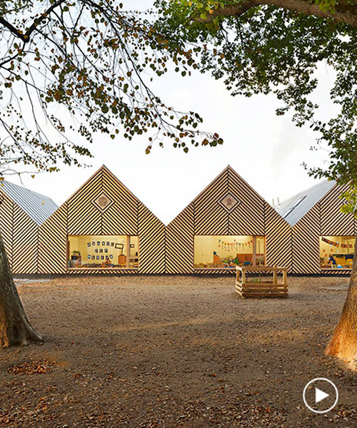 this school in perthes-en-gâtinais comprises multiple gabled wooden volumes
