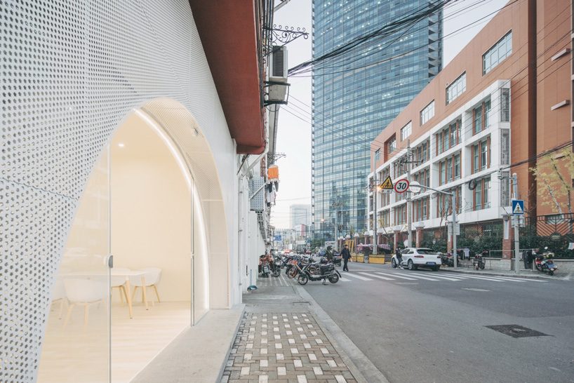 wutopia lab completes shanghai community space with arched façade and interiors