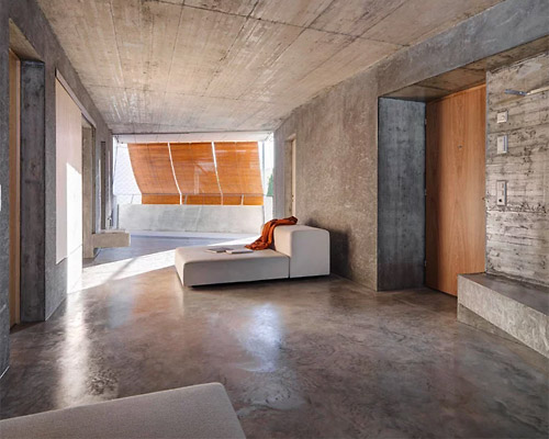 gus wüstemann architects' low-cost concrete housing block in zurich surburb