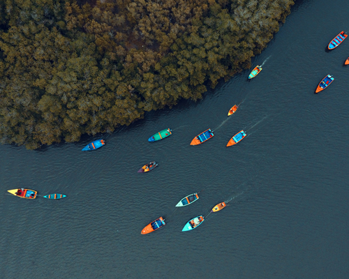 52 rusty fishing boats painted to preserve marine biodiversity