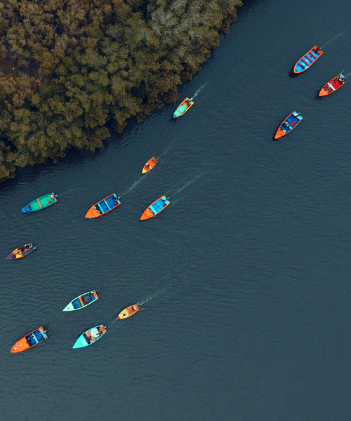 52 rusty fishing boats painted to preserve marine biodiversity