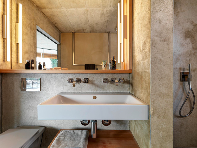 gus wüstemann architects' low-cost concrete housing block in zurich surburb