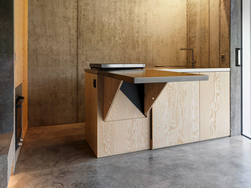 gus wüstemann architects' low-cost concrete housing block in zurich surburb