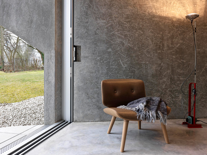 gus wüstemann architects' low-cost concrete housing block in zurich surburb