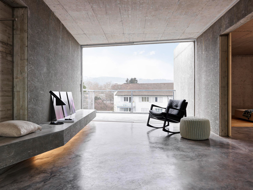 gus wüstemann architects' low-cost concrete housing block in zurich surburb